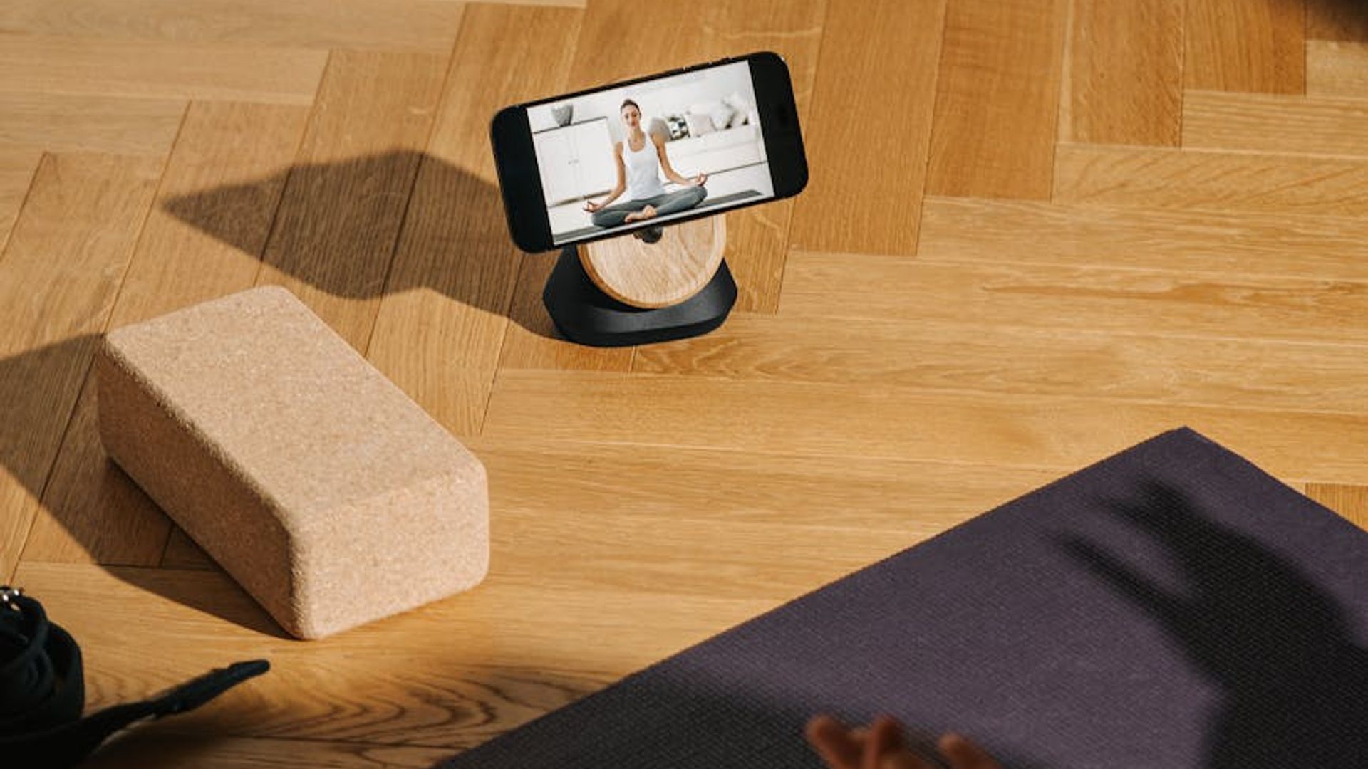 Minimalist yoga studio with soft morning sunlight on the floor